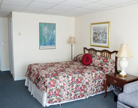Sea Whale Motel deck room with one queen bed and sleeper sofa